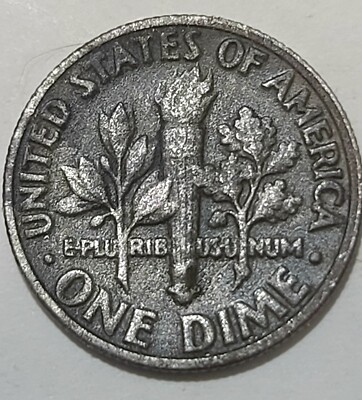 1985 dime missing clad layer error showing exposed copper core on one side