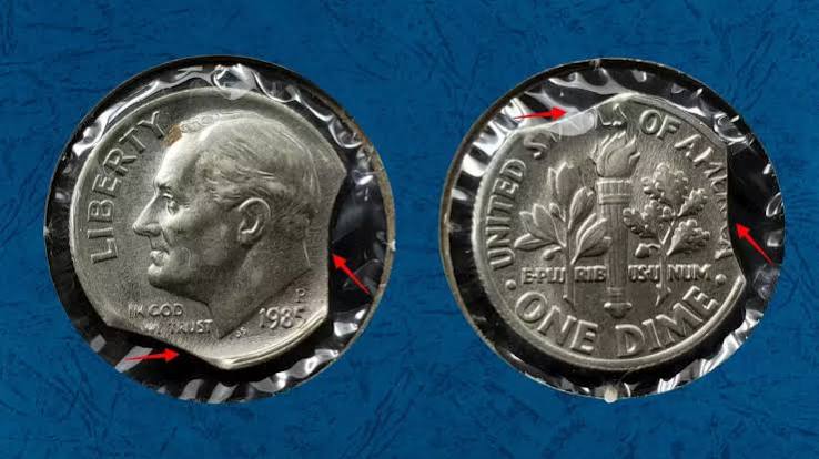 1985 dime clipped planchet error showing missing curved section from coin edge